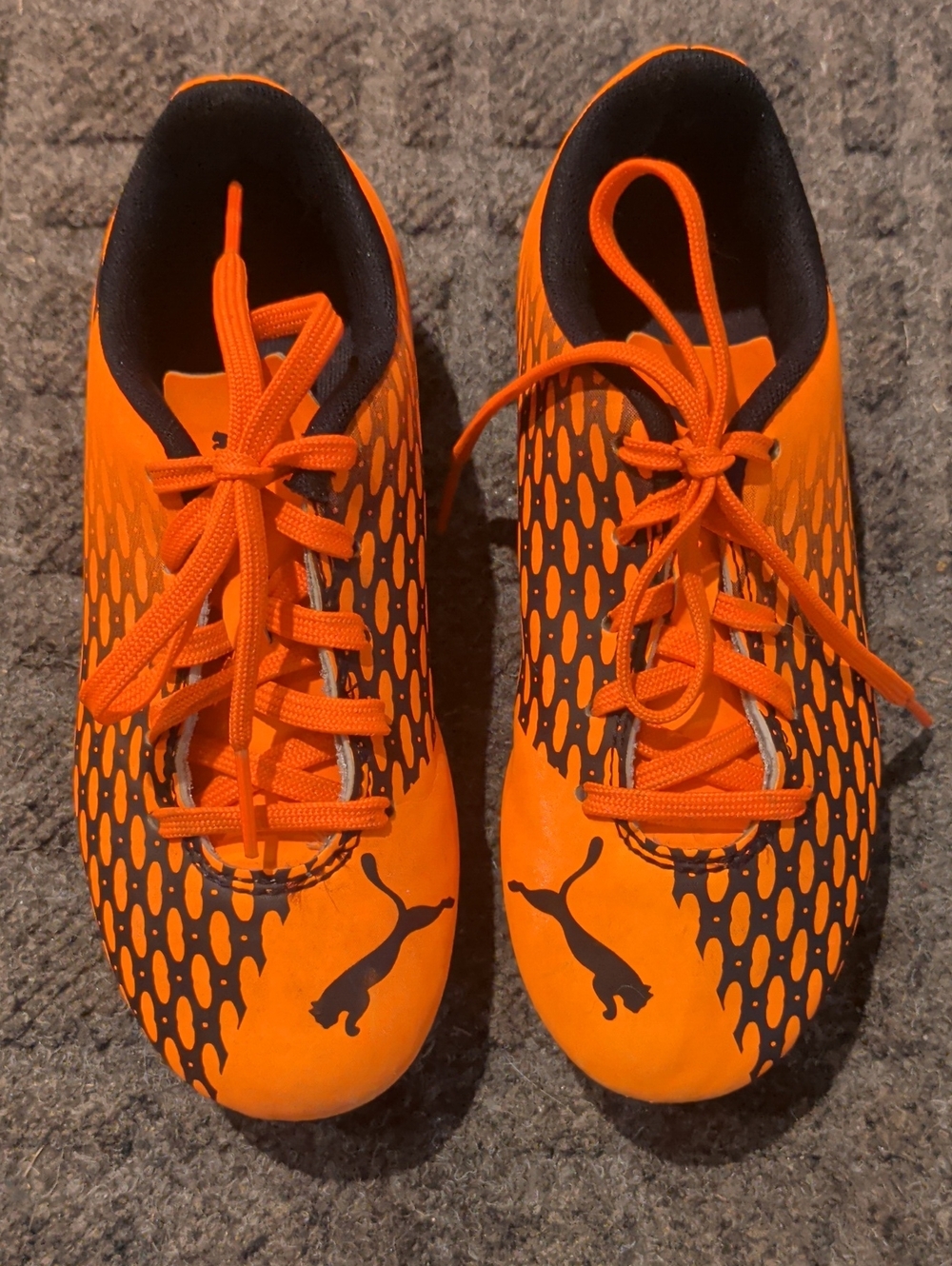 Puma Bright Orange and Black Soccer Cleats